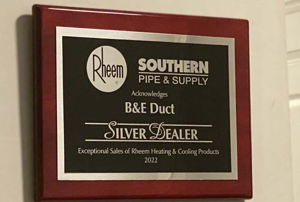 Plaque awarded to B&E Duct by Southern Pipe & Supply, designating them as a Rheem Silver Dealer for exceptional sales of Rheem heating and cooling products in 2022